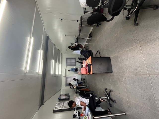 Dr. Kanwal Matharu led a wet lab session with four second-year students, where he provided hands-on instruction in setting up the microscope for optimal viewing, tying sutures, and answering all their questions.