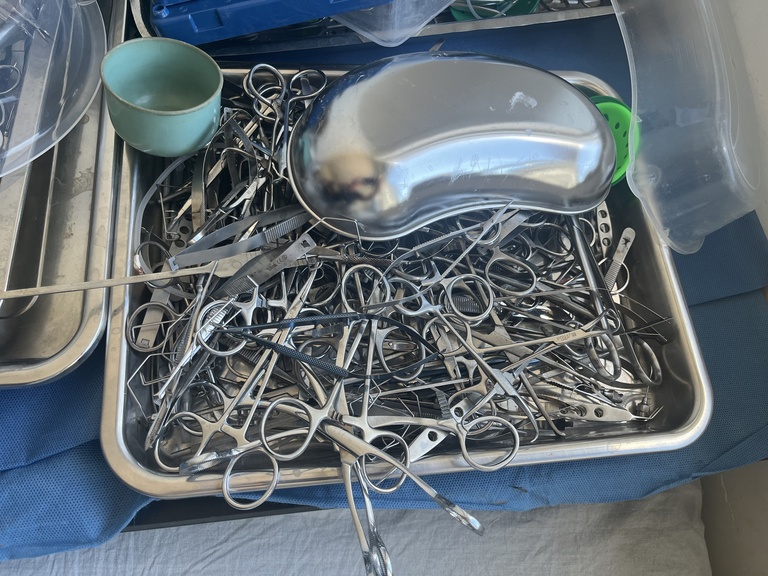 Storage room with communal sterilized instruments at University Teaching Hospital.