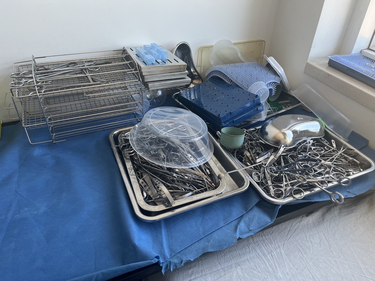 Storage room with communal sterilized instruments at University Teaching Hospital.