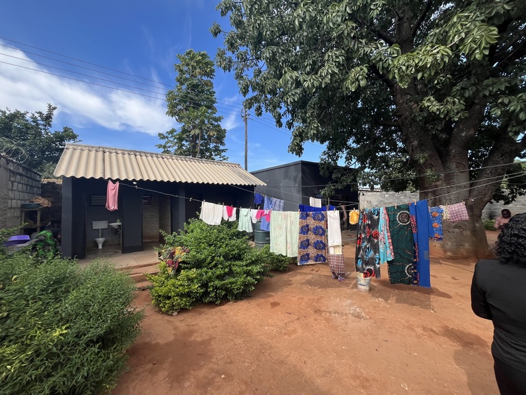 House of Hope linen drying area and restroom.