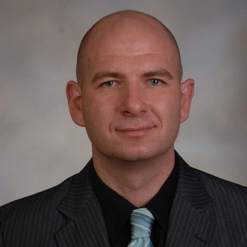 Dr. Budd Tucker