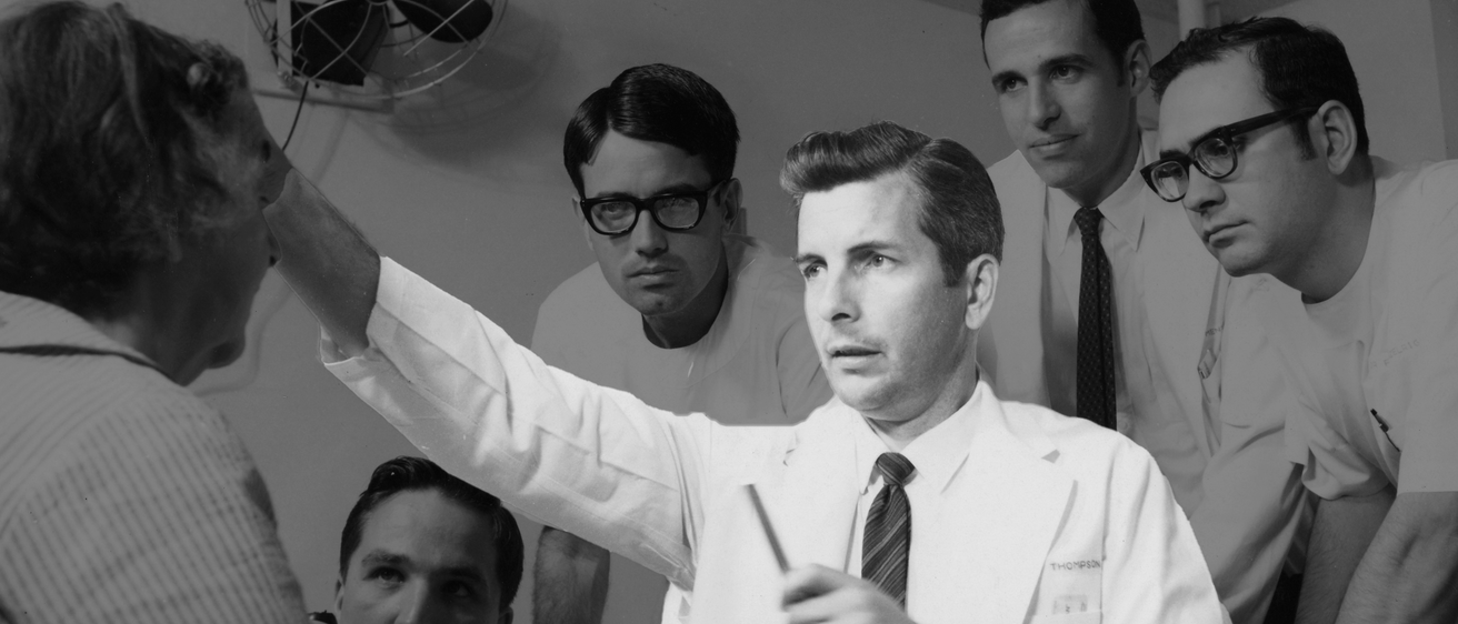 Dr. Thompson giving eye exam